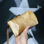 Criss-cross Tassel Clutch