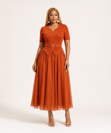 Aveline burnt orange pleated chiffon long midi dress with embellished V neckline, decorative beaded peplum waist and matching elastic belt - TORFEO