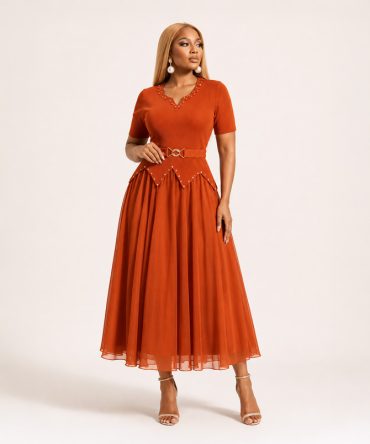 Aveline burnt orange pleated chiffon long midi dress with embellished V neckline, decorative beaded peplum waist and matching elastic belt - TORFEO