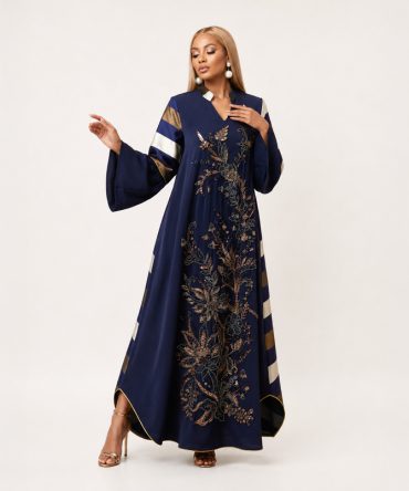 Imperia Luxe Embellished Navy Blue Maxi Dress featuring intricate floral embellishments, striped sleeve and back panels, flowing bell sleeves, and a graceful full-length silhouette for women - TORFEO