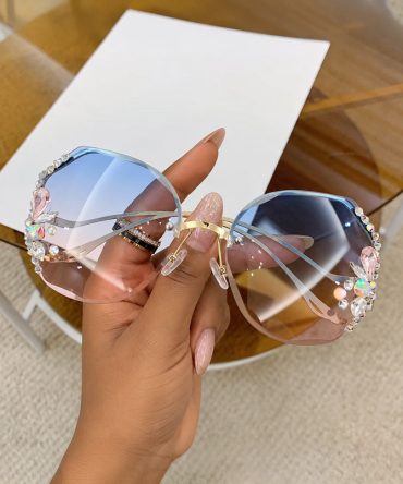 Crystal rimless sunglasses for women with blue pink gradient lenses and gold-tone frame - TORFEO