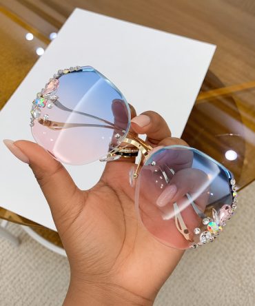 Crystal rimless sunglasses for women with blue pink gradient lenses and gold-tone frame - TORFEO
