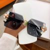 Jeweled Glamour black rimless sunglasses for women with crystal-style embellishments and pearl-like side details - TORFEO