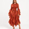 Dusty orange tiered shimmer dress with pleated layers, long sleeves and matching fabric tie belt - TORFEO