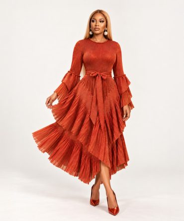 Dusty orange tiered shimmer dress with pleated layers, long sleeves and matching fabric tie belt - TORFEO
