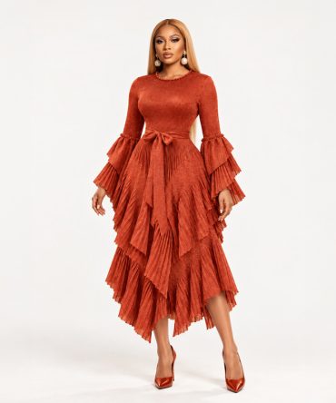 Dusty orange tiered shimmer dress with pleated layers, long sleeves and matching fabric tie belt - TORFEO