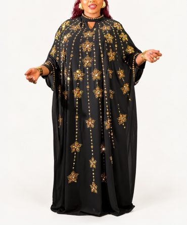 Black and gold embellished Boubou two-piece dress set with gold starburst details and matching inner dress - TORFEO